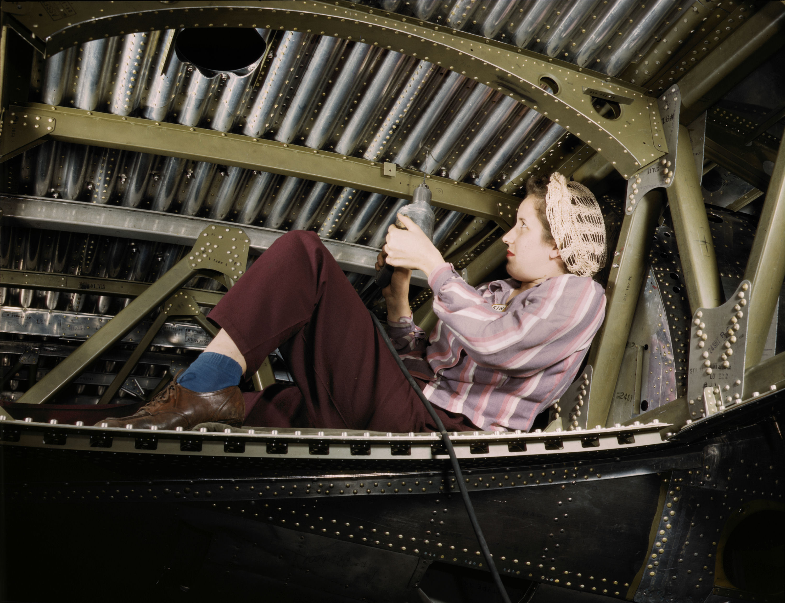 A-20 Bomber Being Riveted by Woman Worker