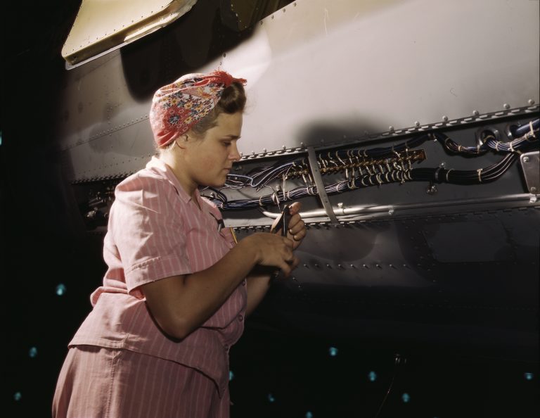 Worker Doing Electrical Assembly At Douglas Aircraft Plant – Women Of