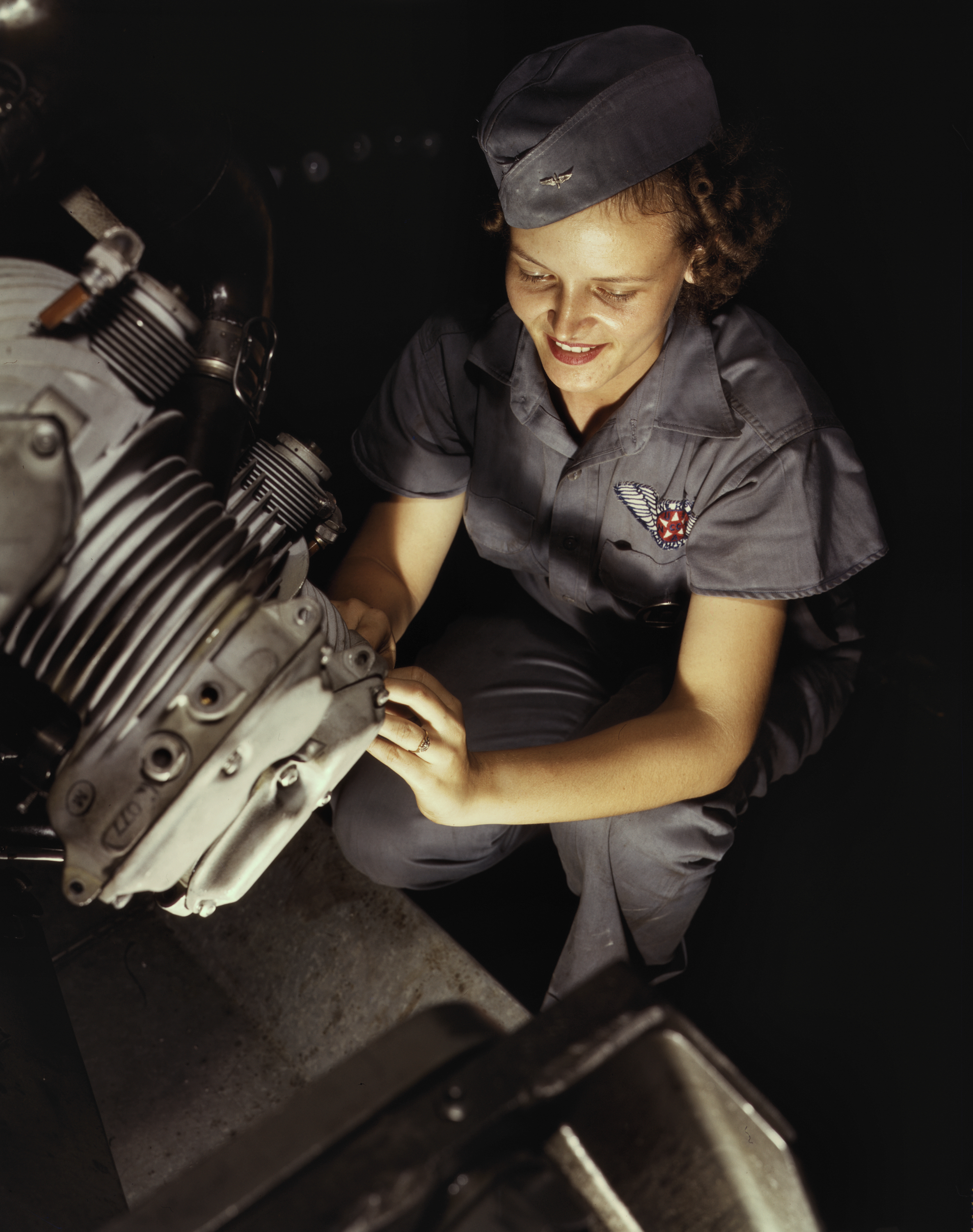 Woman Mechanic Works on a Wright Whirlwind Motor