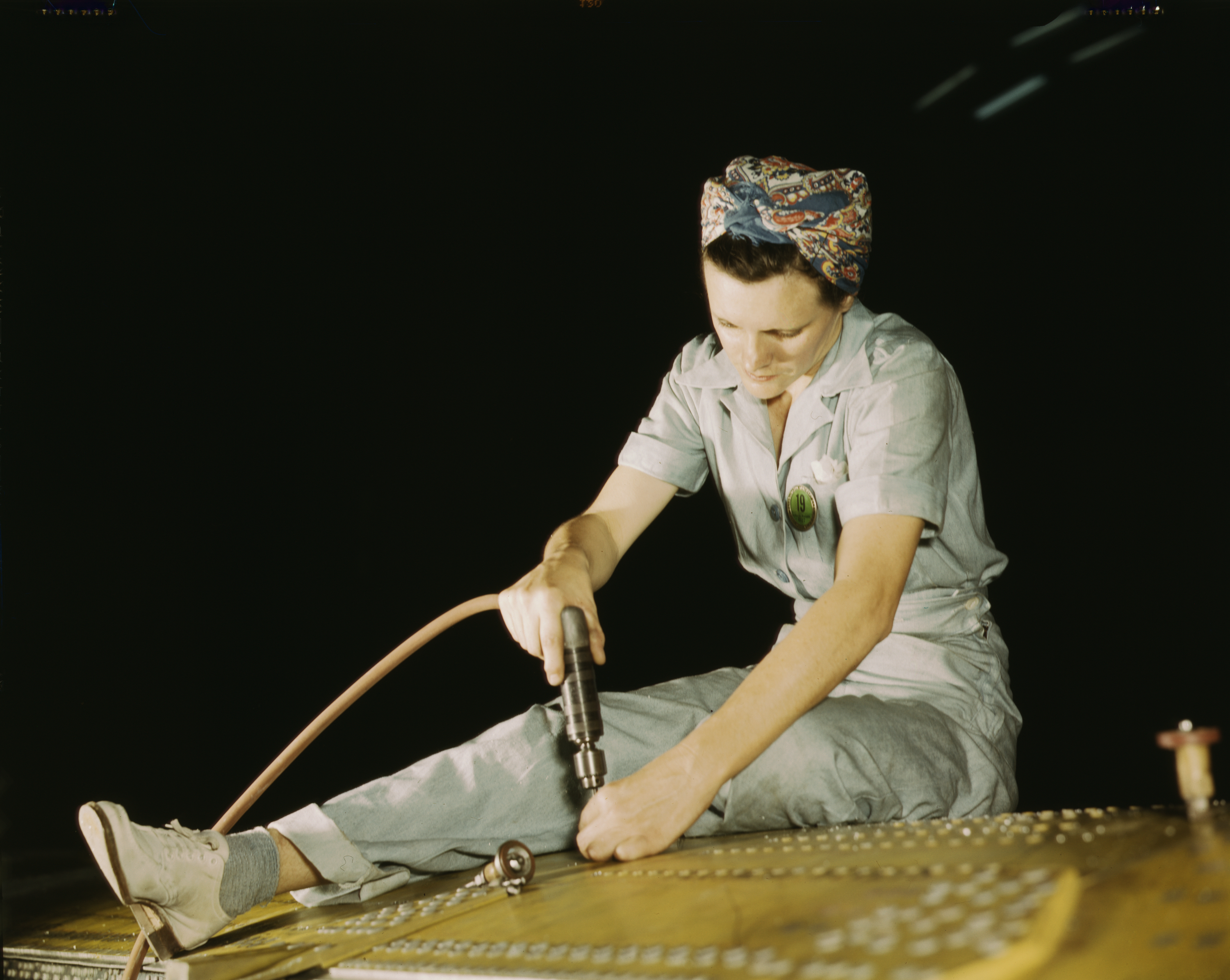 Aircraft Worker Drilling on a Liberator Bomber