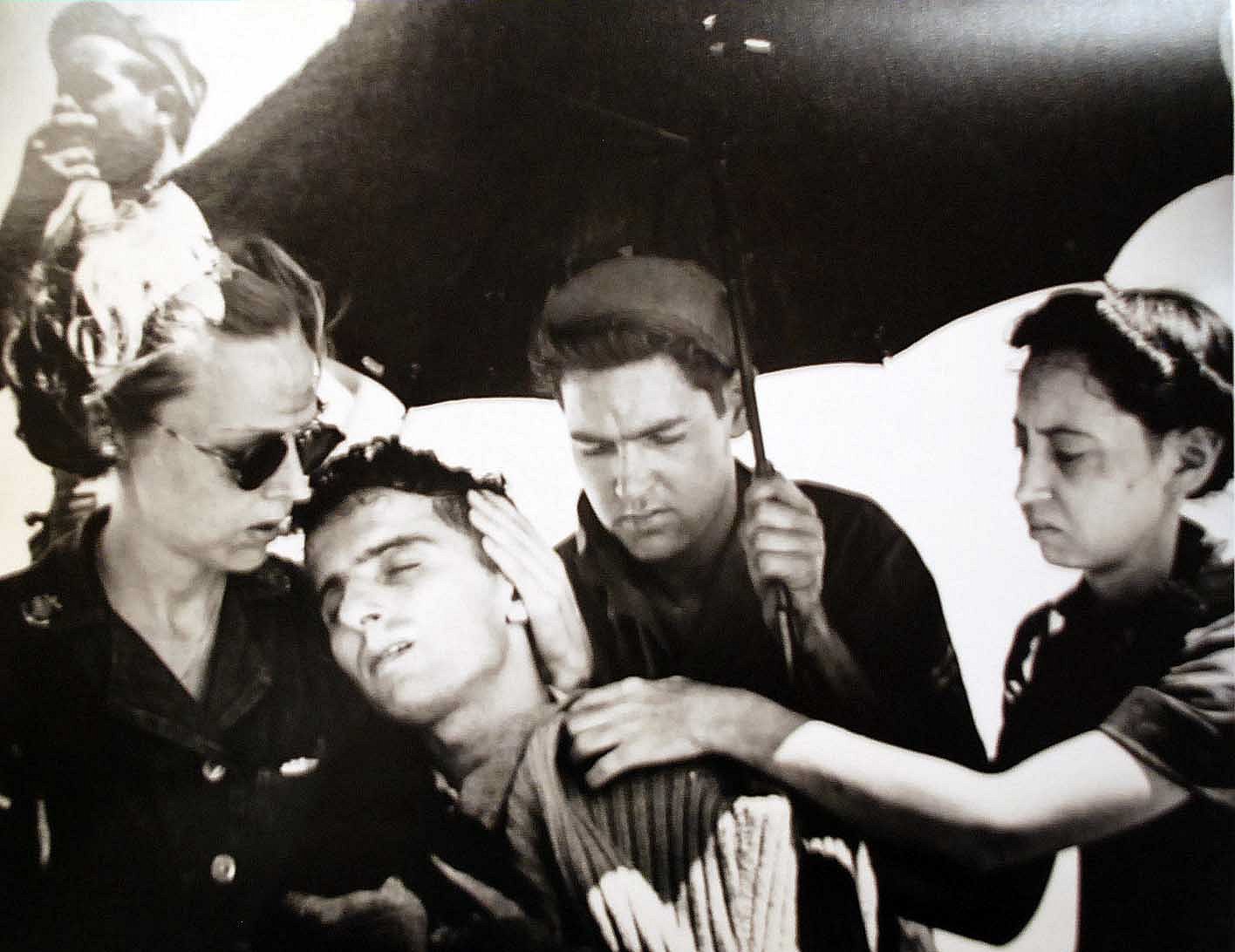 Navy Nurses Attend to Exhausted Serviceman