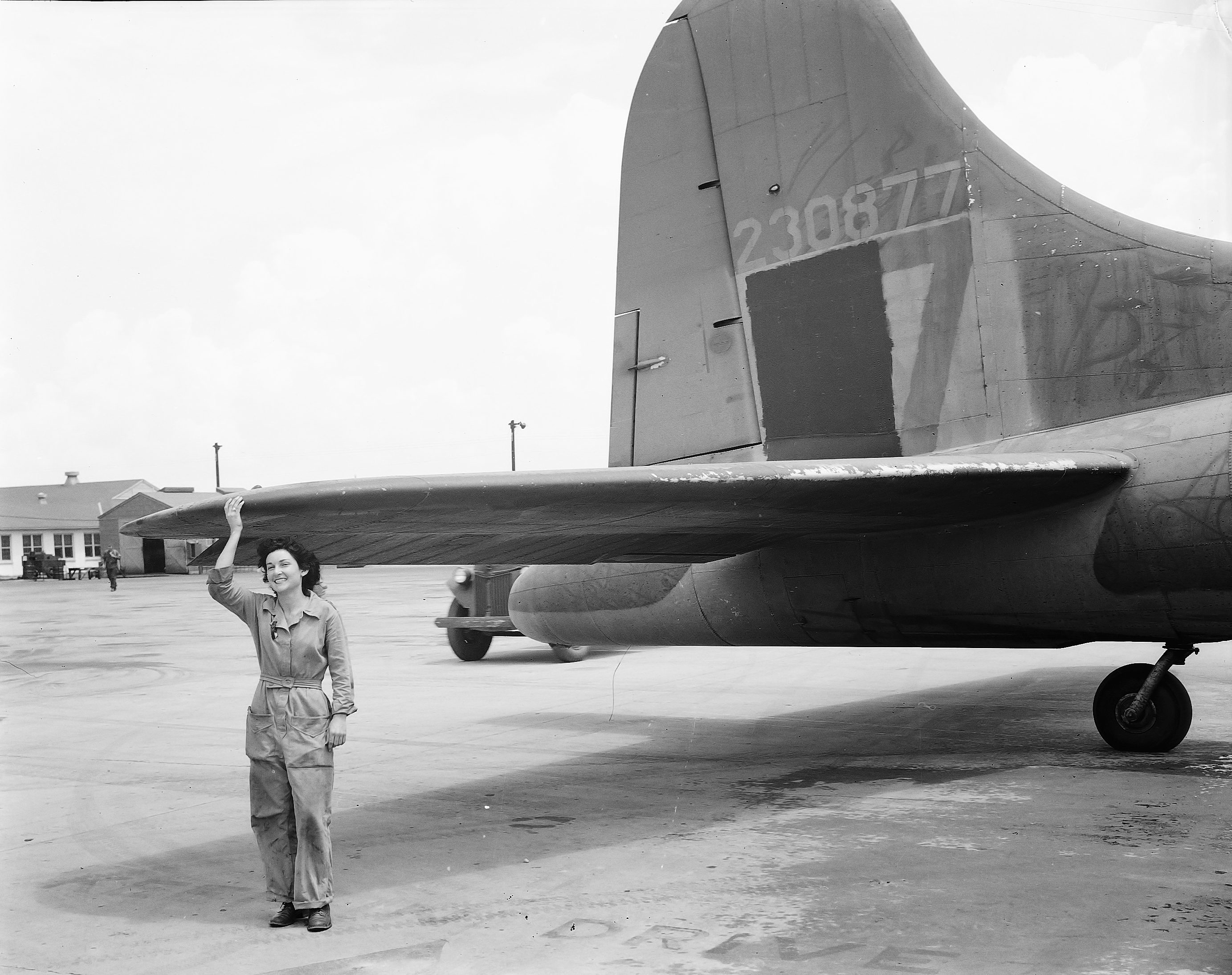 WAC Aircraft Mechanic Poses With B-17 at Tyndall Field