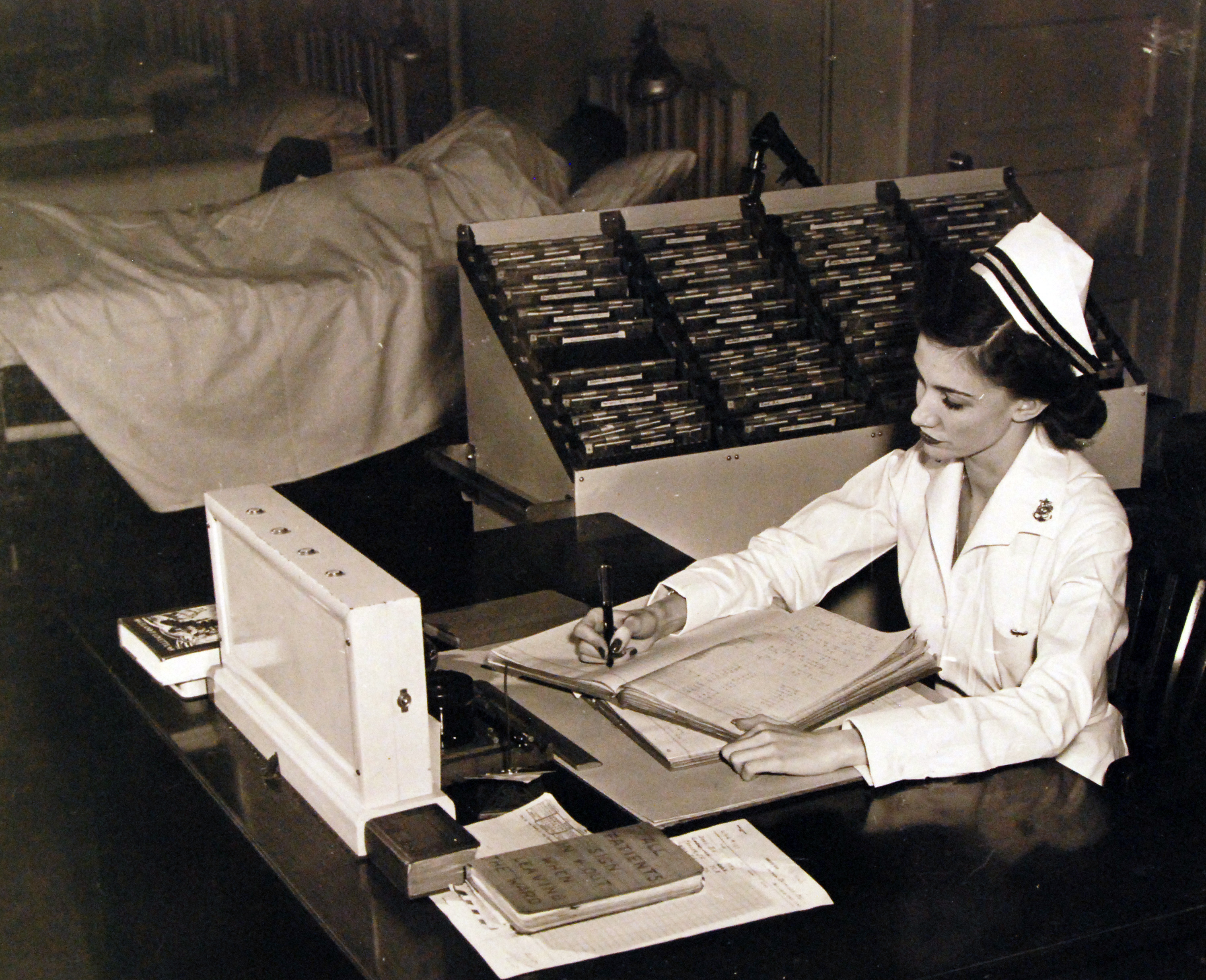 Navy Nurse Keeps the Books in Order