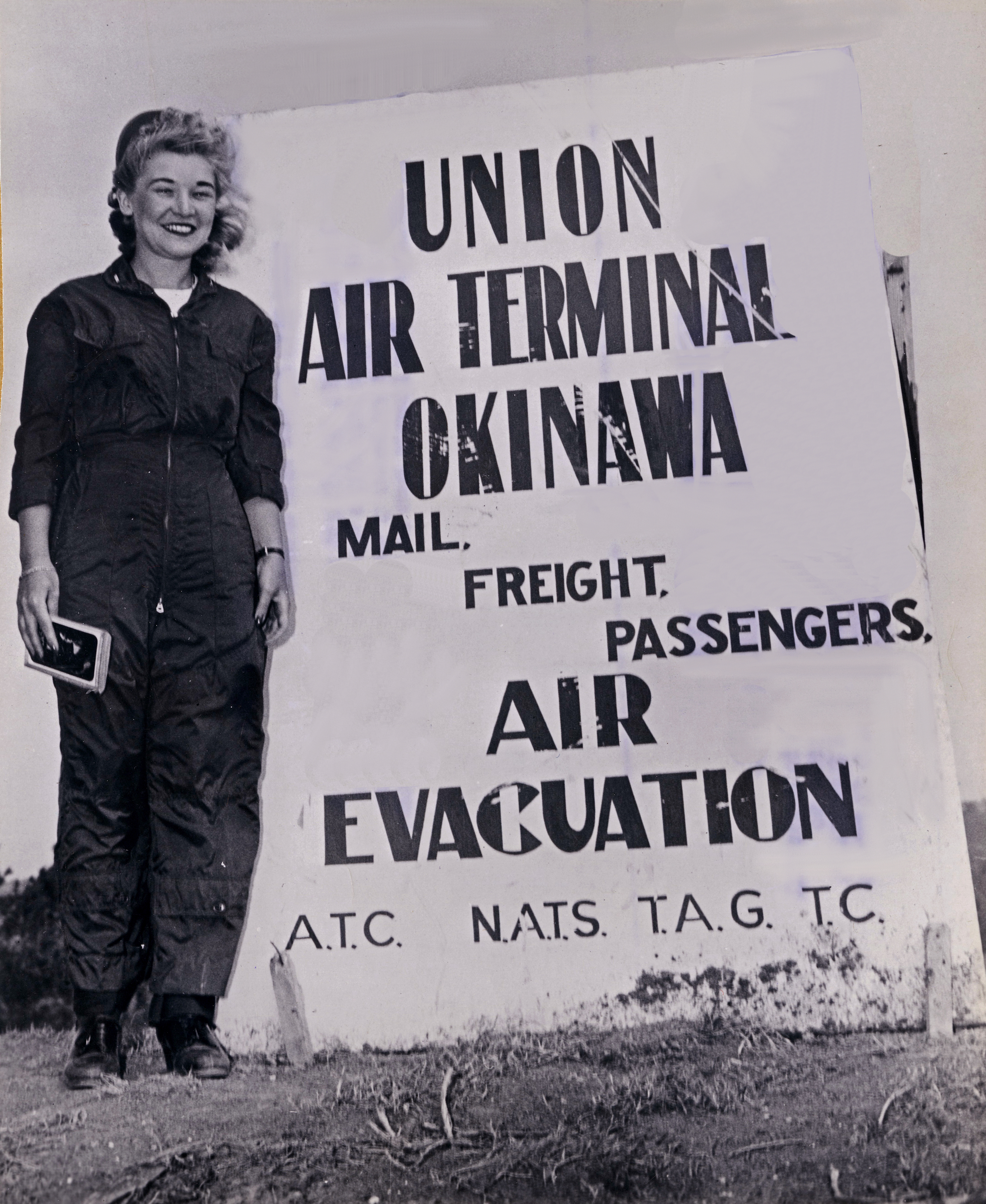 Navy Flight Nurse with Air Terminal Okinawa Sign