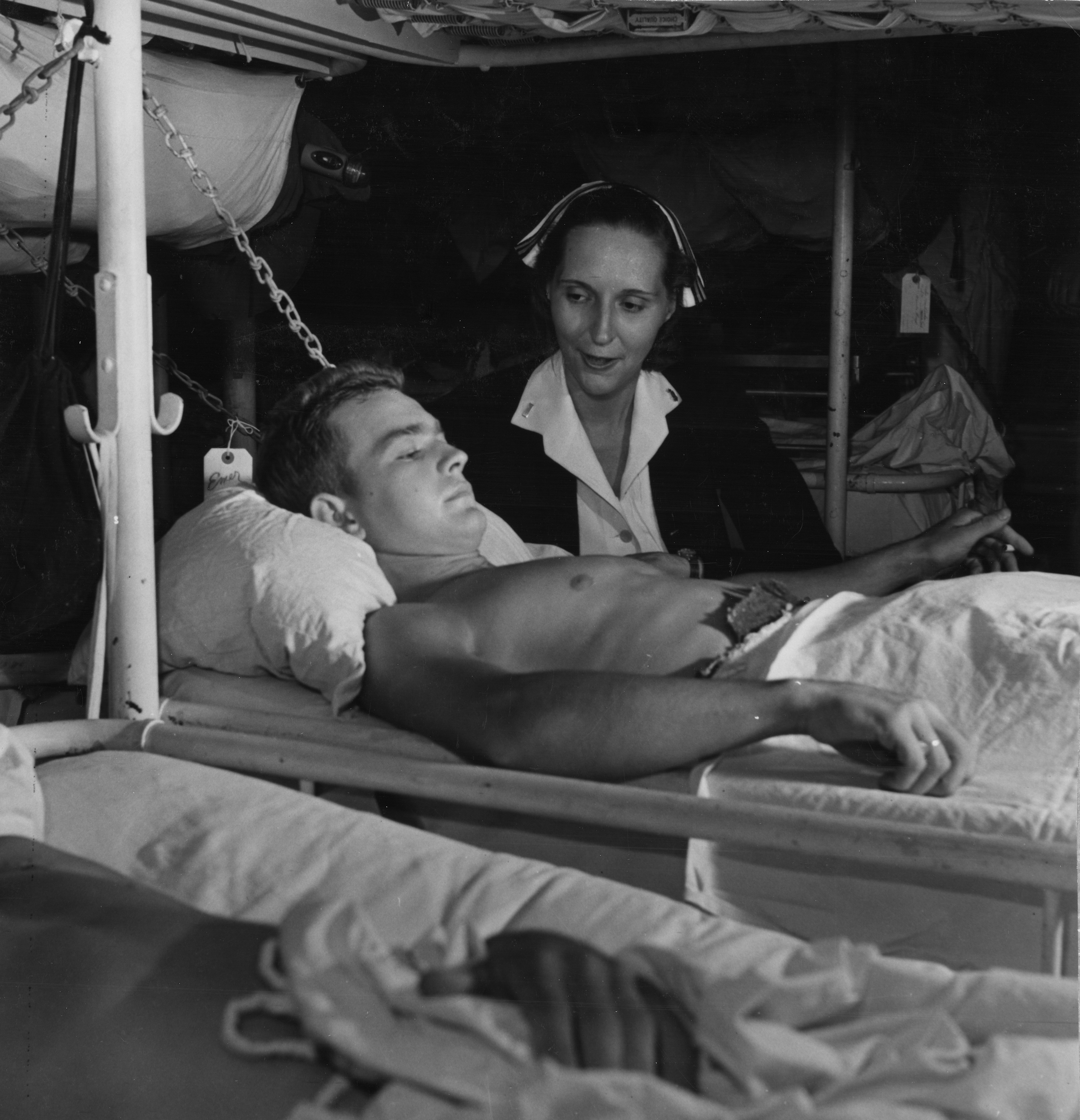 Nurse With Patient on Hospital Ship USS Solace