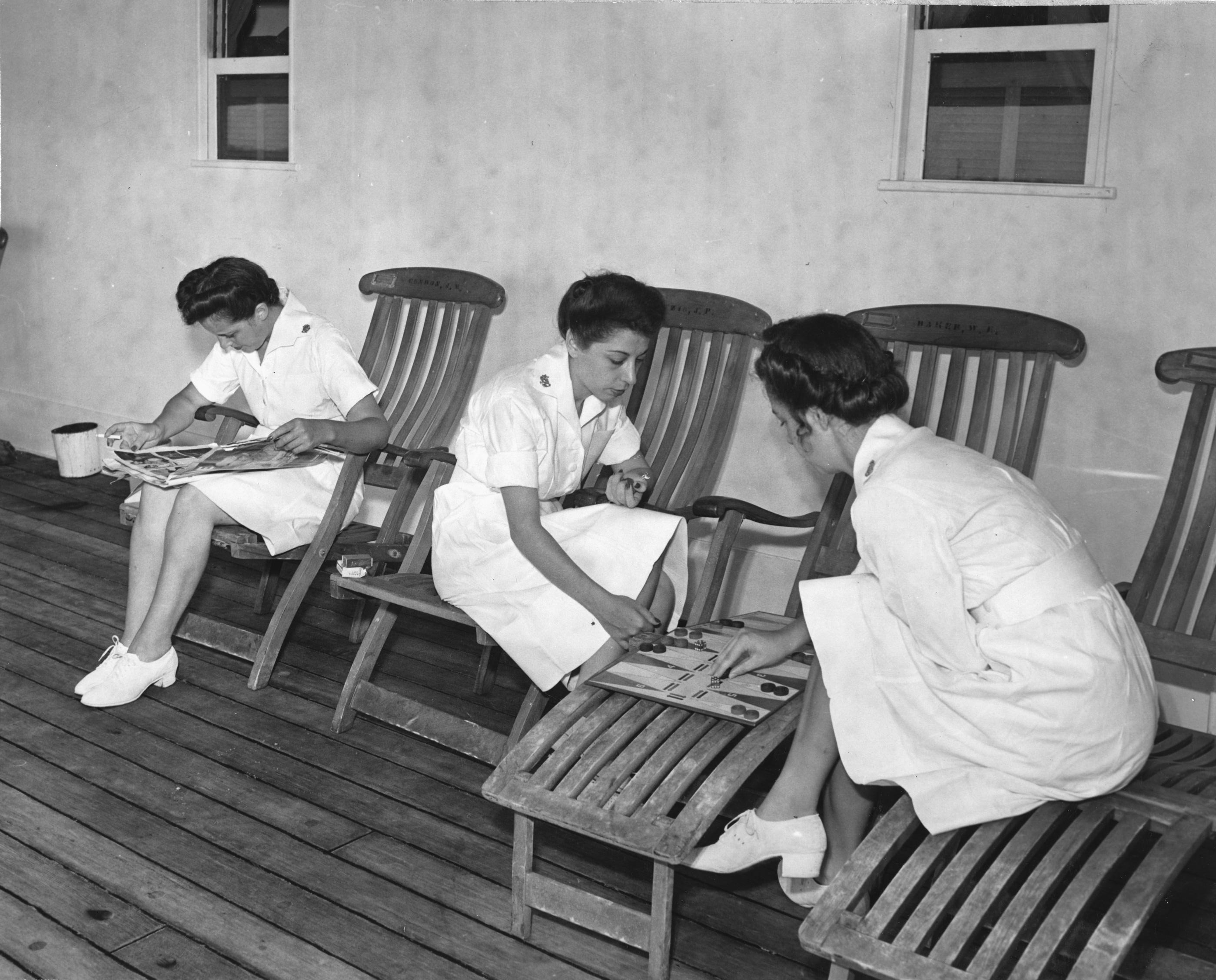 Nurses Read and Play a Game on Hospital Ship