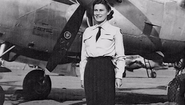 Iris Cummings Standing in Front of Aircraft